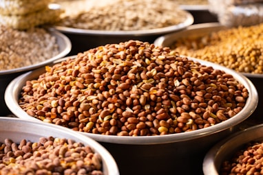 a bunch of different types of food in bowls