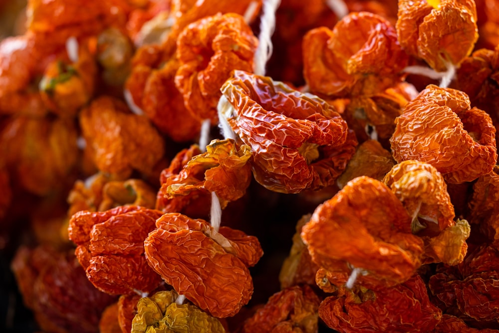 a pile of dried fruit sitting on top of a table