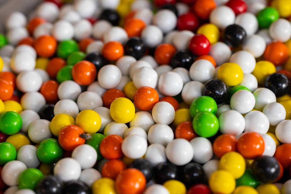 a bowl filled with lots of different colored candies