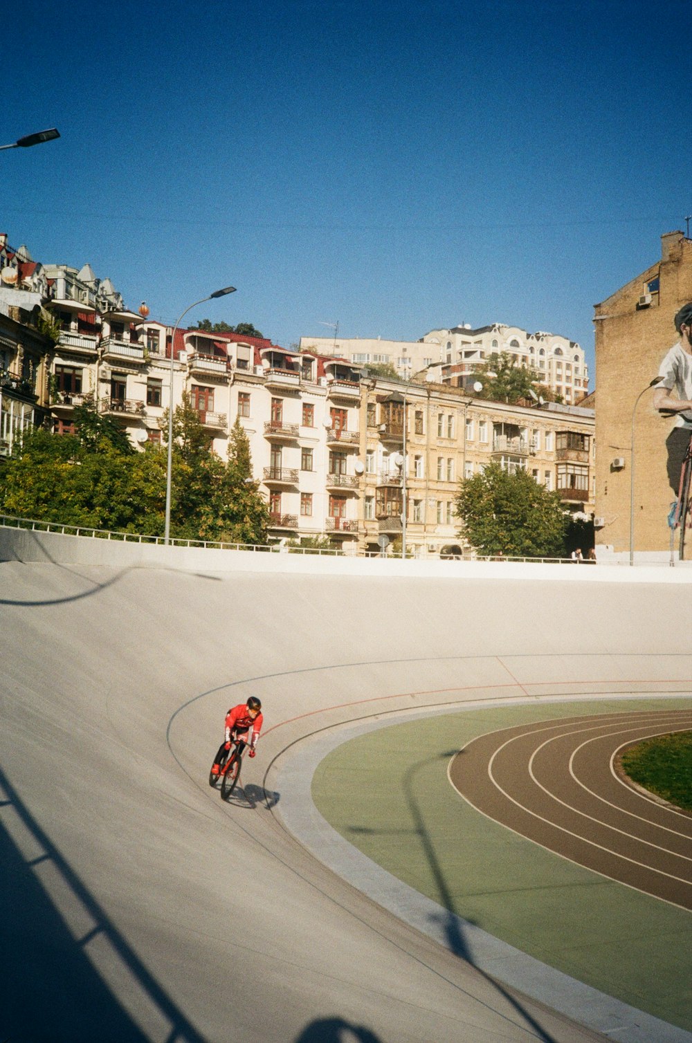 a man riding a motorcycle down a curvy road