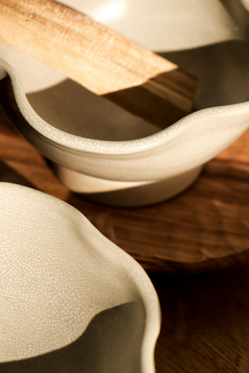 a close up of a bowl and spoon on a table