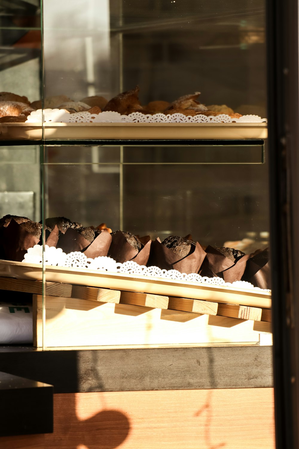 a display case filled with lots of different types of pastries