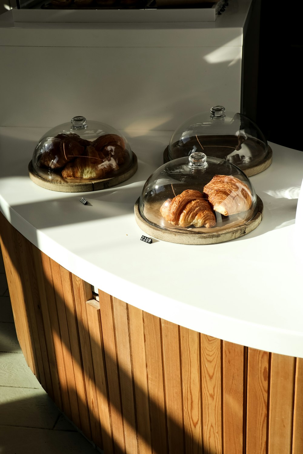 a couple of trays of food sitting on top of a counter