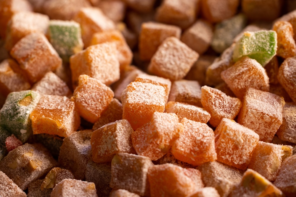 a close up of a pile of sugar cubes