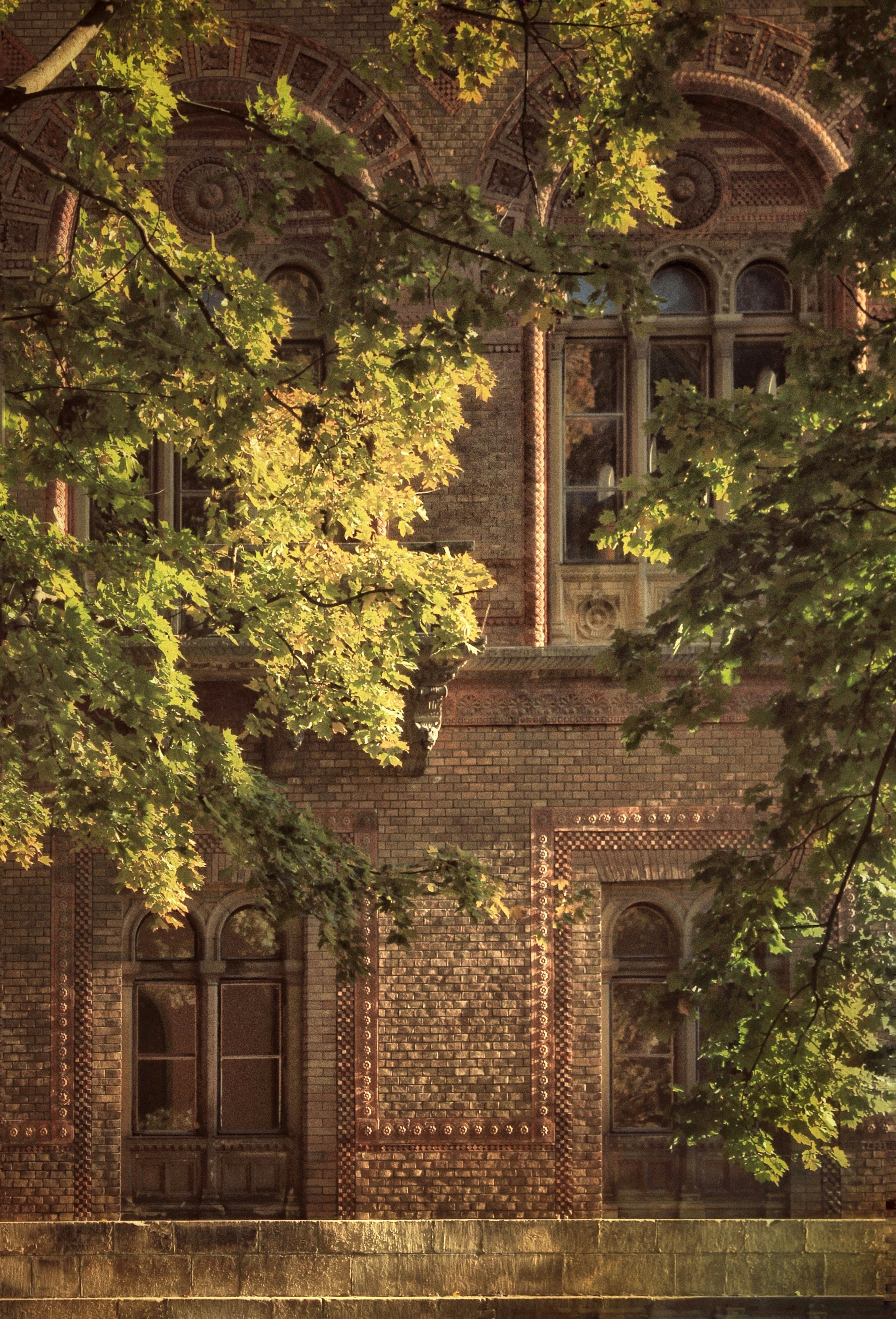 a large building with a clock on the side of it