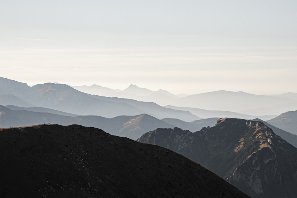 a person standing on top of a mountain