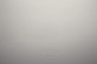 A calming meditation app interface with soothing colors and simple controls.