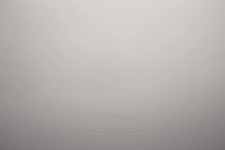 A warm gray textured background symbolizing calm and connection