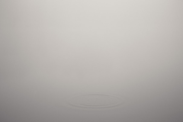 A calming meditation app screen featuring serene backgrounds and simple controls.