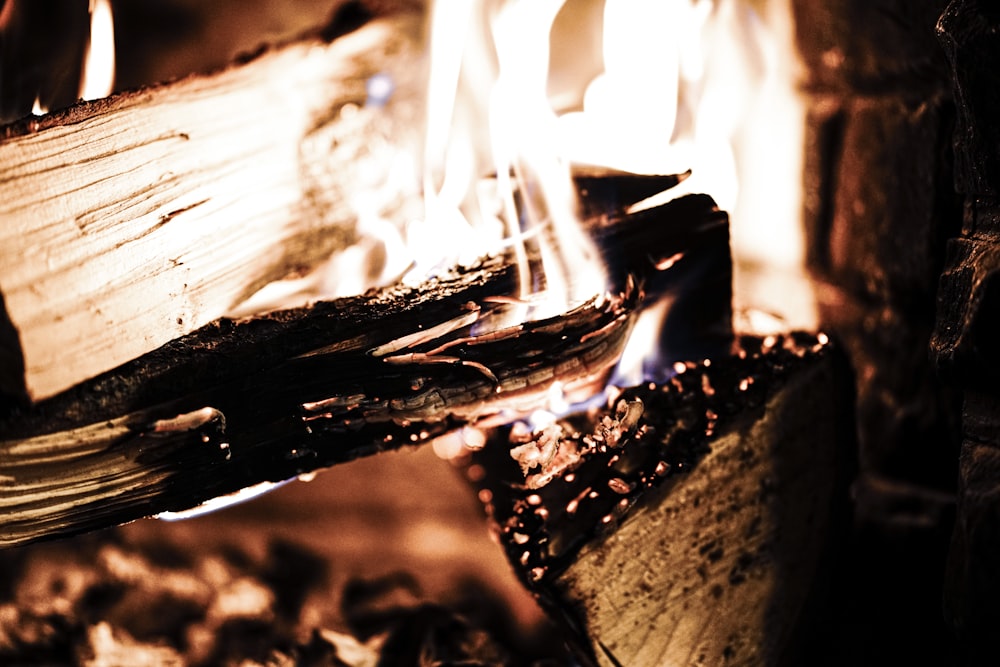 a close up of a fire burning in a fireplace