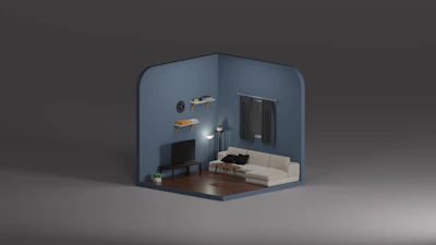 Living room interior transformed with minimalist design and navy blue walls accented by orange decor.