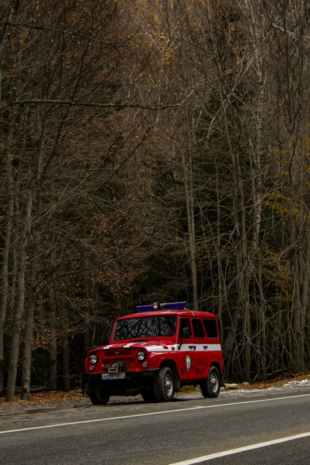 a red truck parked on the side of the road