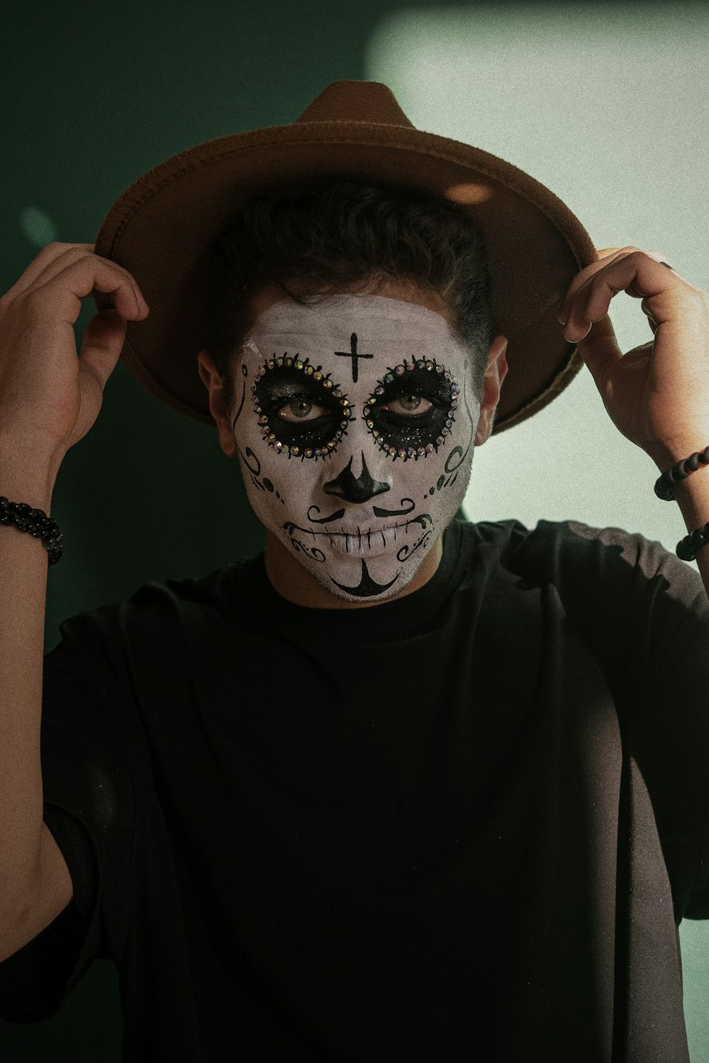 a man with a face painted like a skeleton