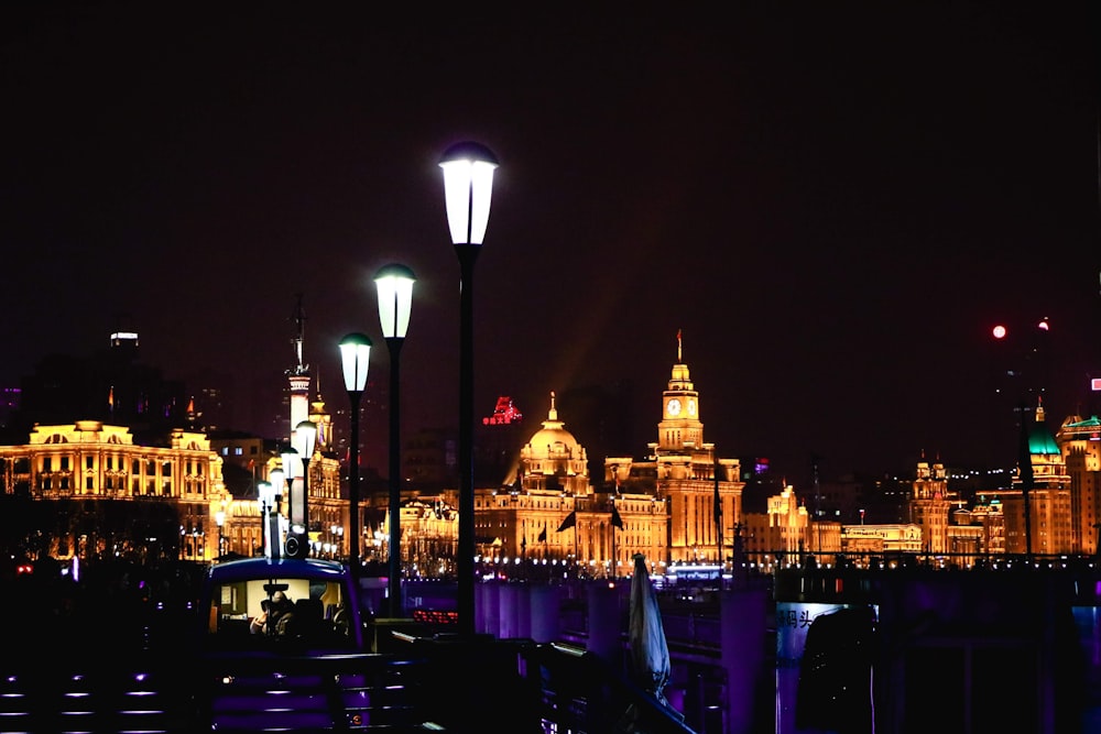 a view of a city at night from across the river