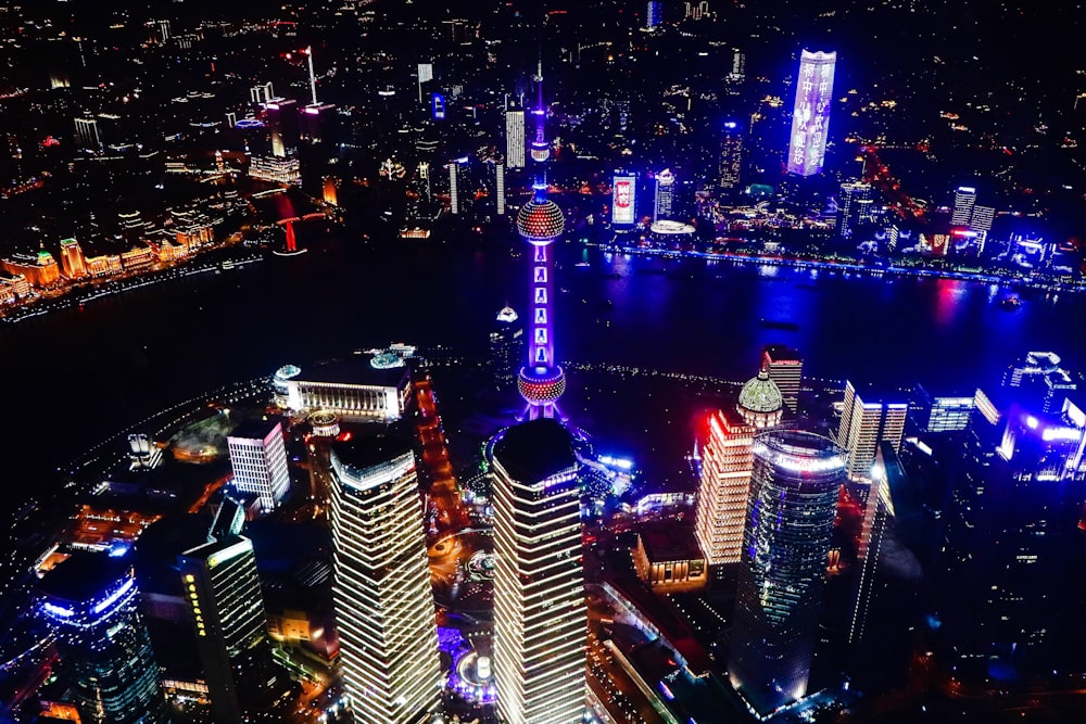 an aerial view of a city at night