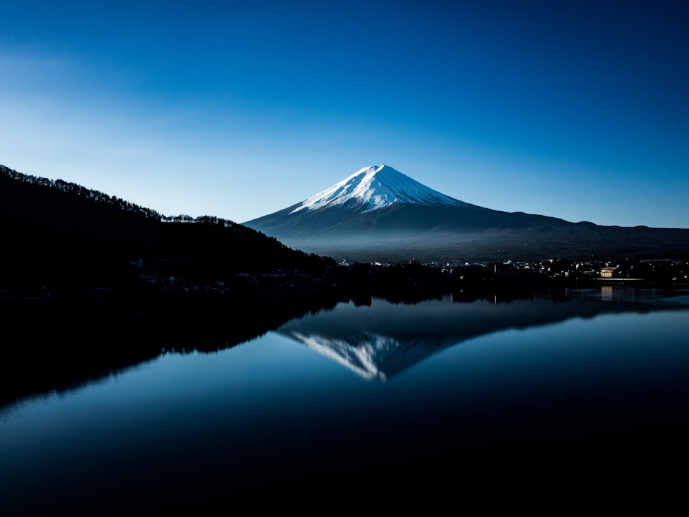 a mountain with a lake in front of it