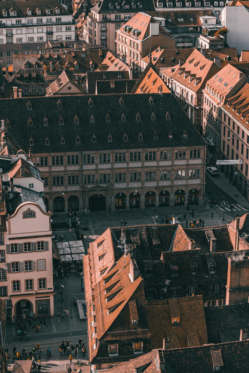 an aerial view of a city with many buildings