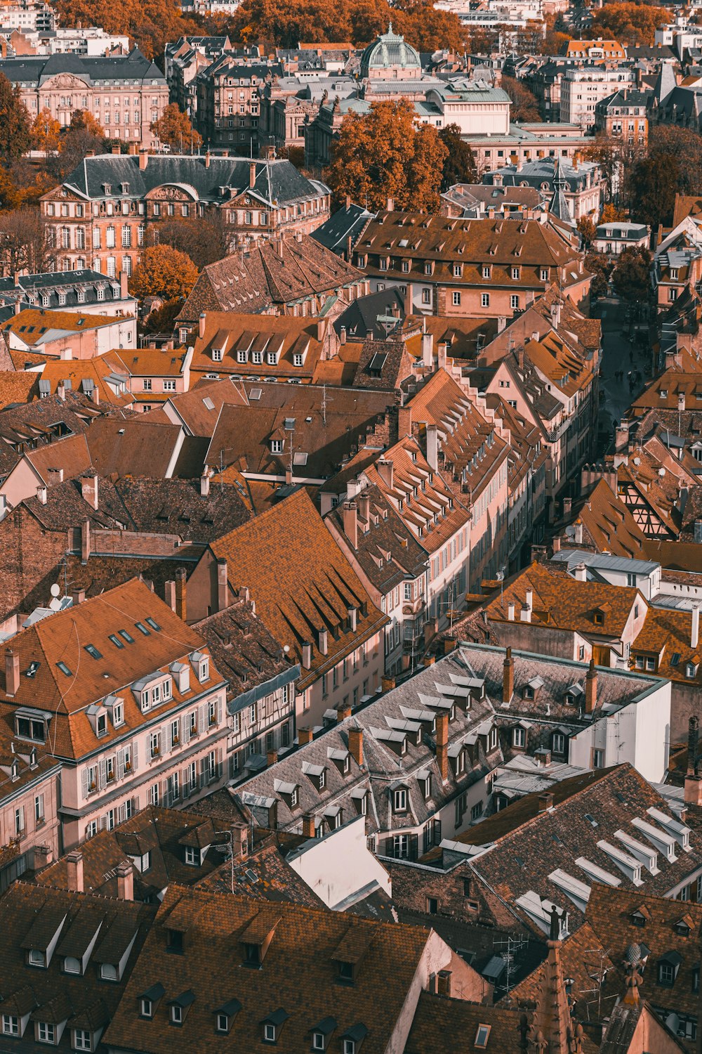 an aerial view of a city with lots of buildings