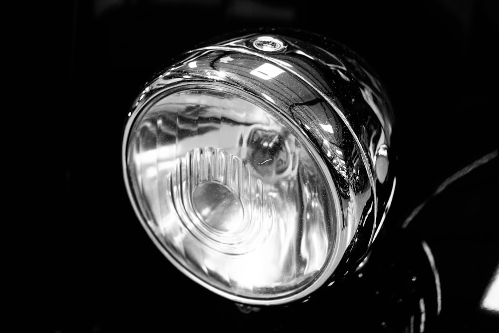 a close up of a headlight on a car