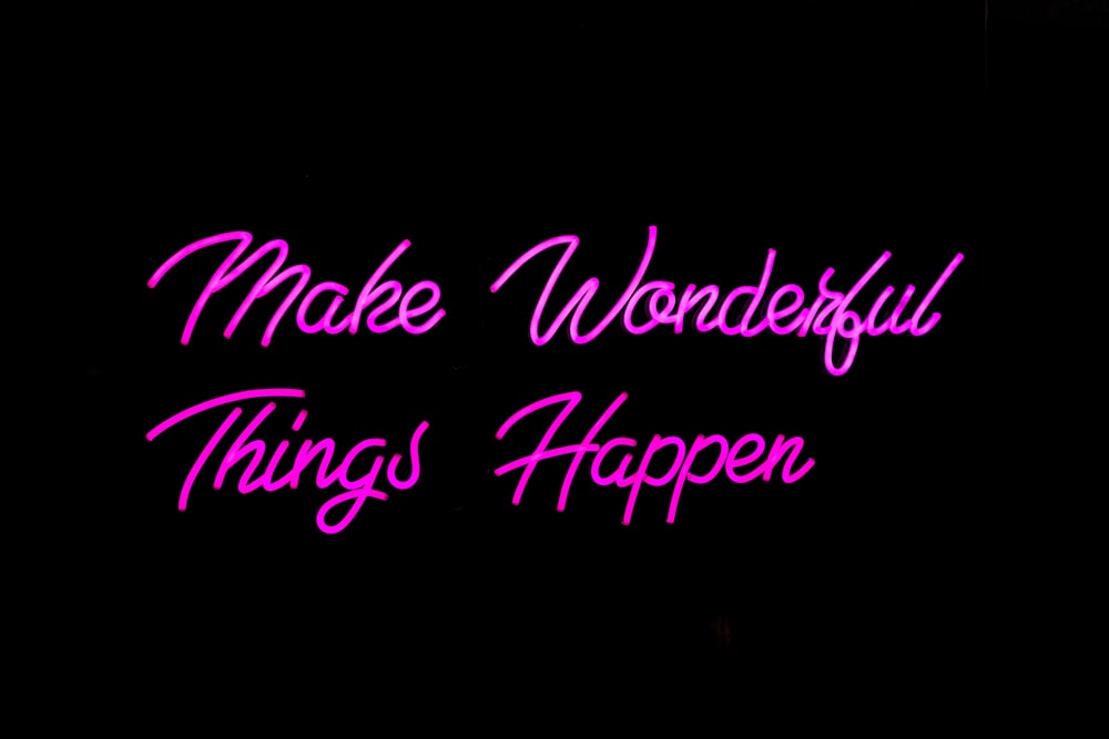 a pink neon sign that says make wonderful things happen