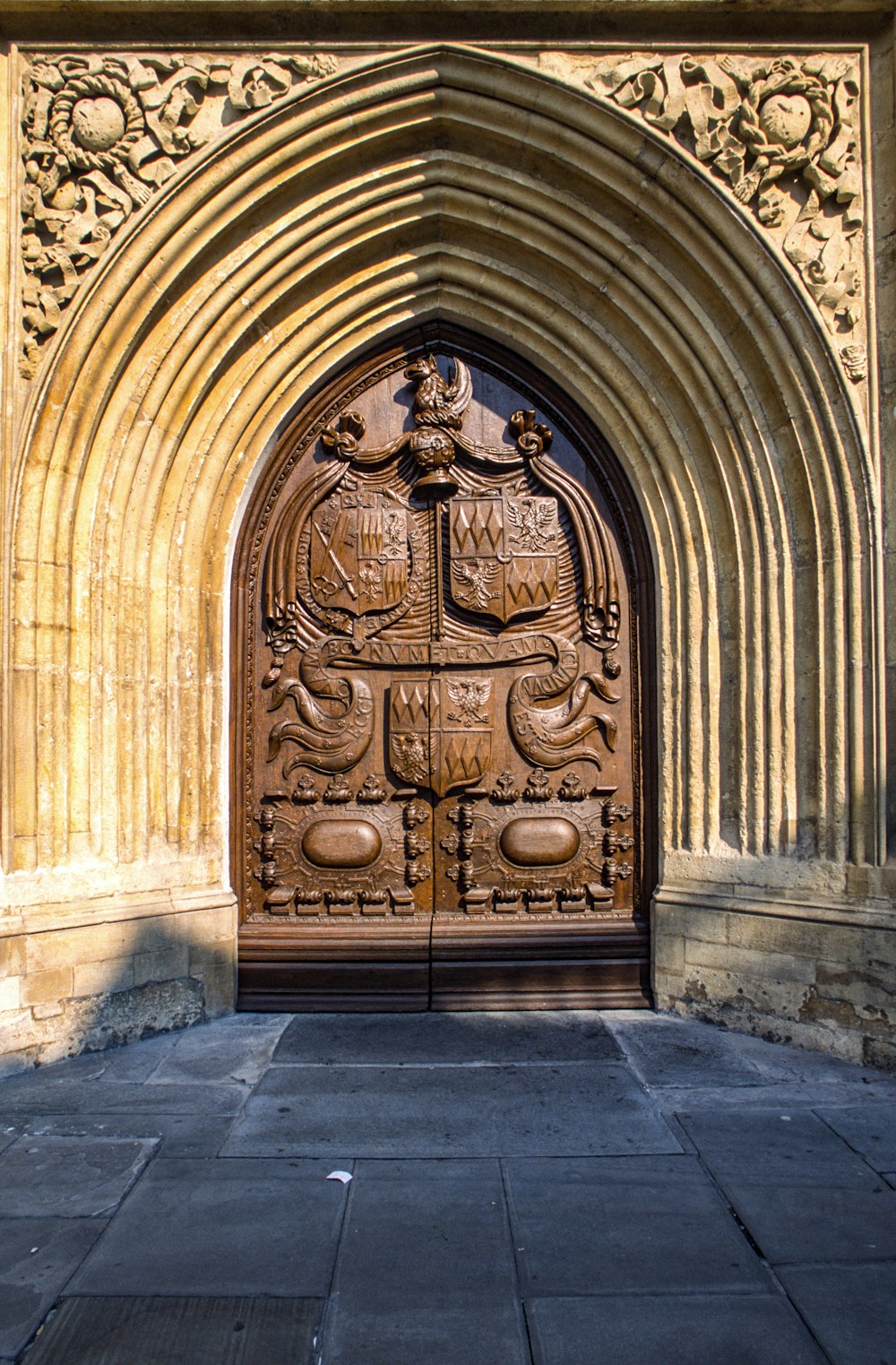 a large wooden door in a stone building
