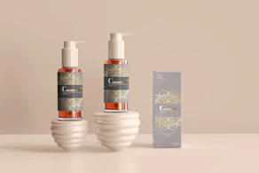 a couple of bottles of lotion sitting next to a box