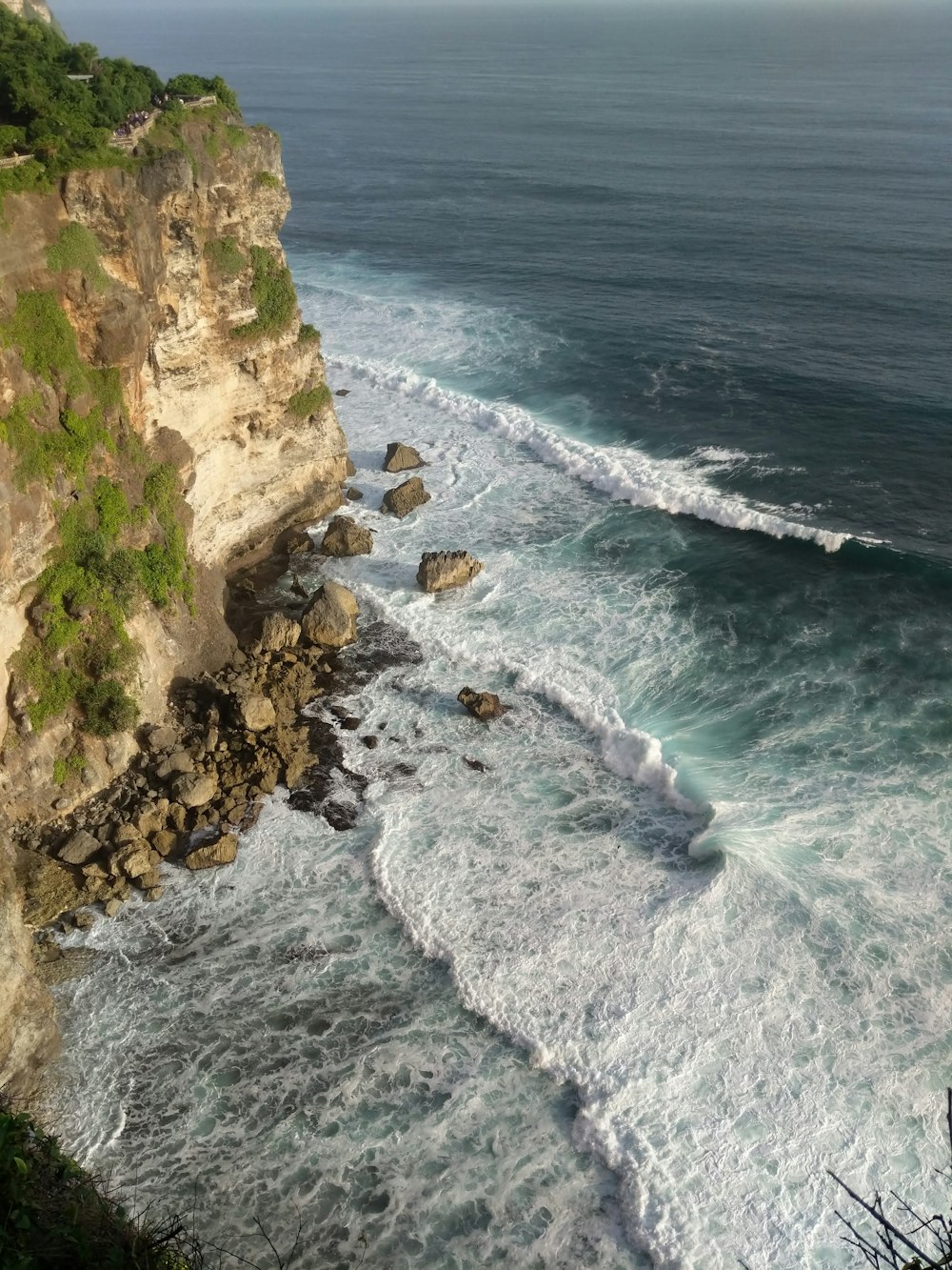 a view of the ocean from a cliff