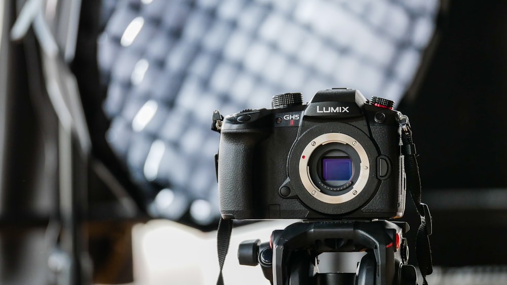 a camera sitting on top of a tripod