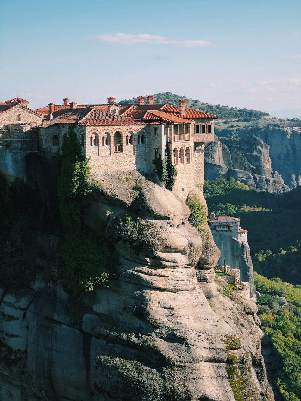 a large building on top of a cliff