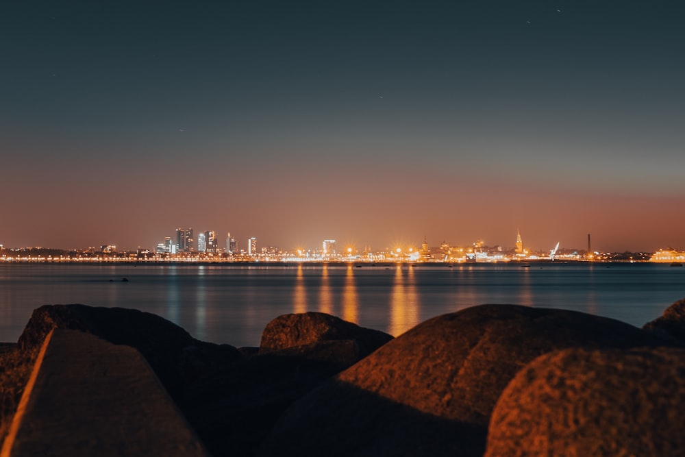 a view of a city at night from across the water