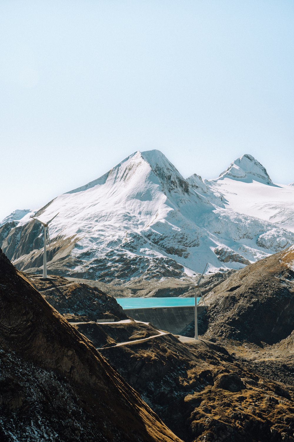 a view of a mountain with a lake in the middle of it