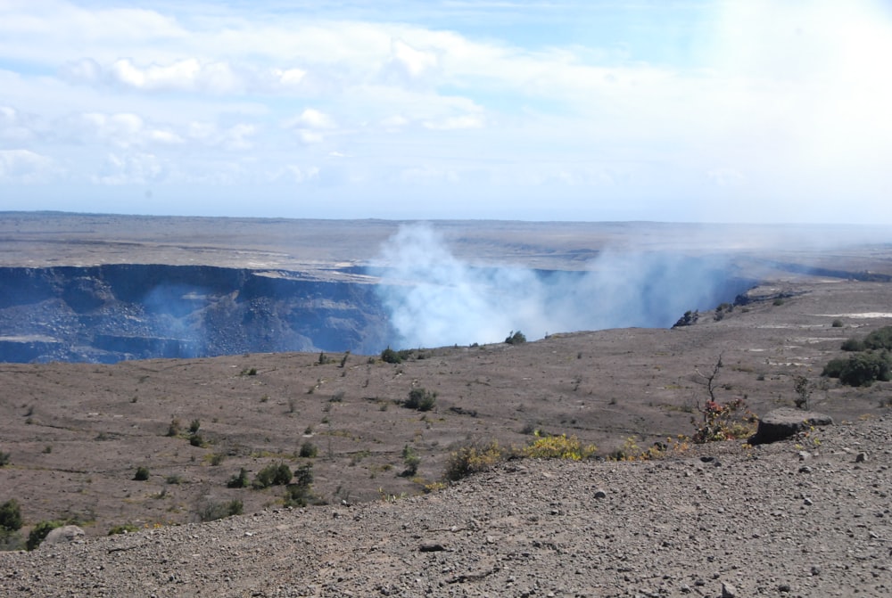 a large open area with a lot of smoke coming out of it