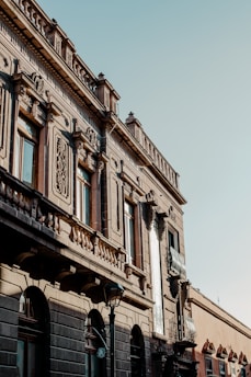 a building with a clock on the front of it