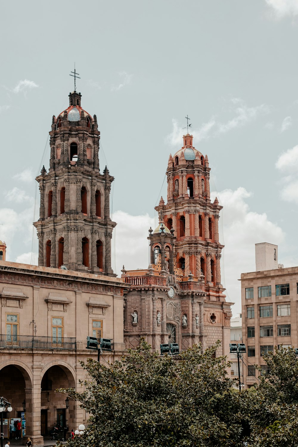 a large building with two towers on top of it