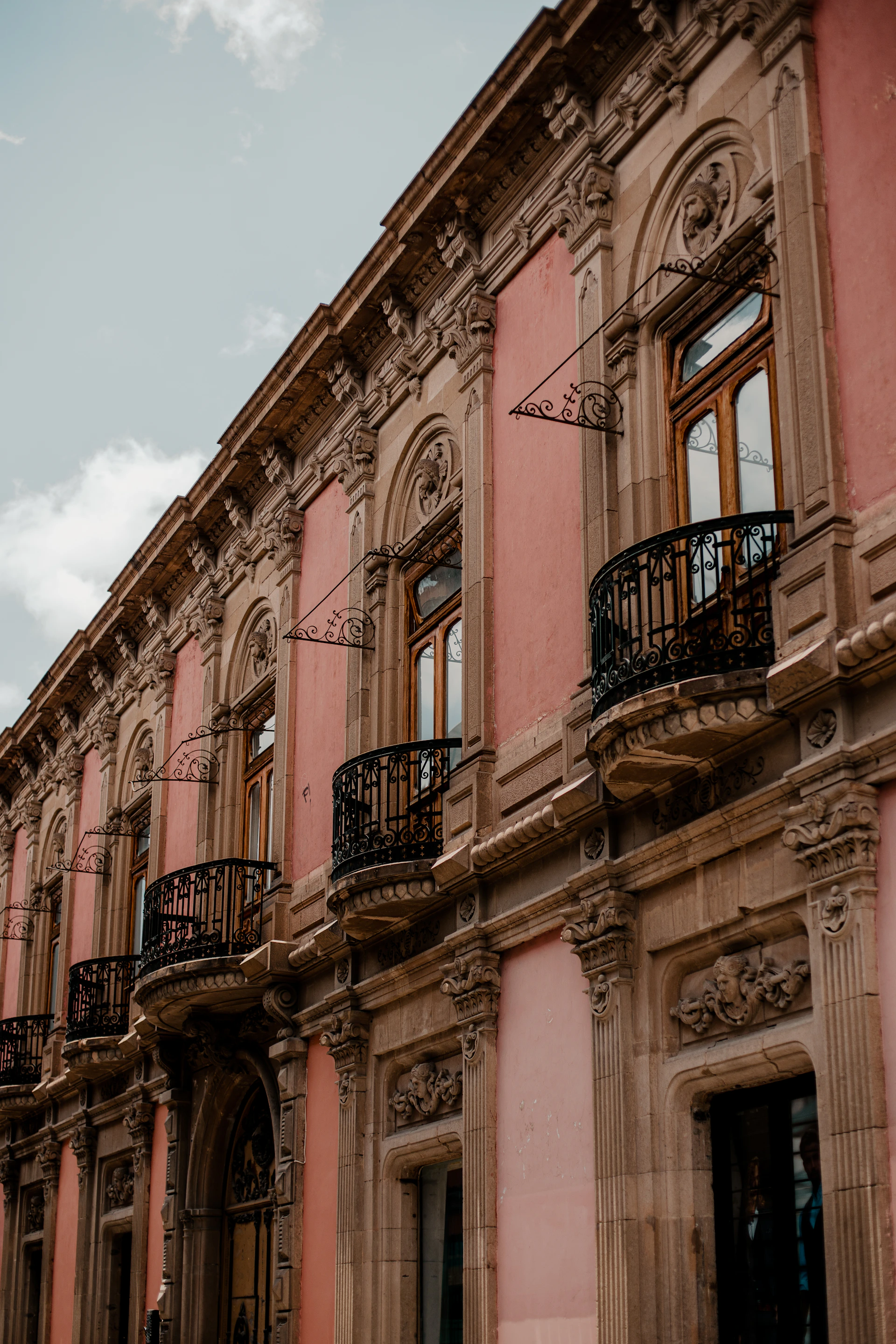 an old building with balconies and balconies on the balconies