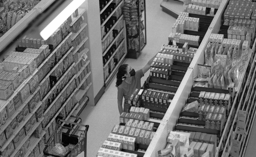 a person in a store with a camera