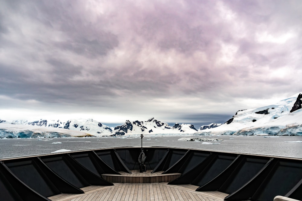 a view from a boat of a mountain range