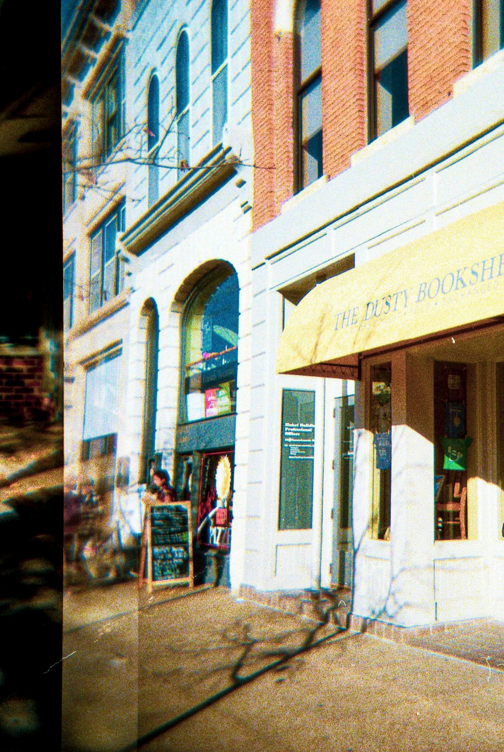 a building with a yellow awning on the front of it