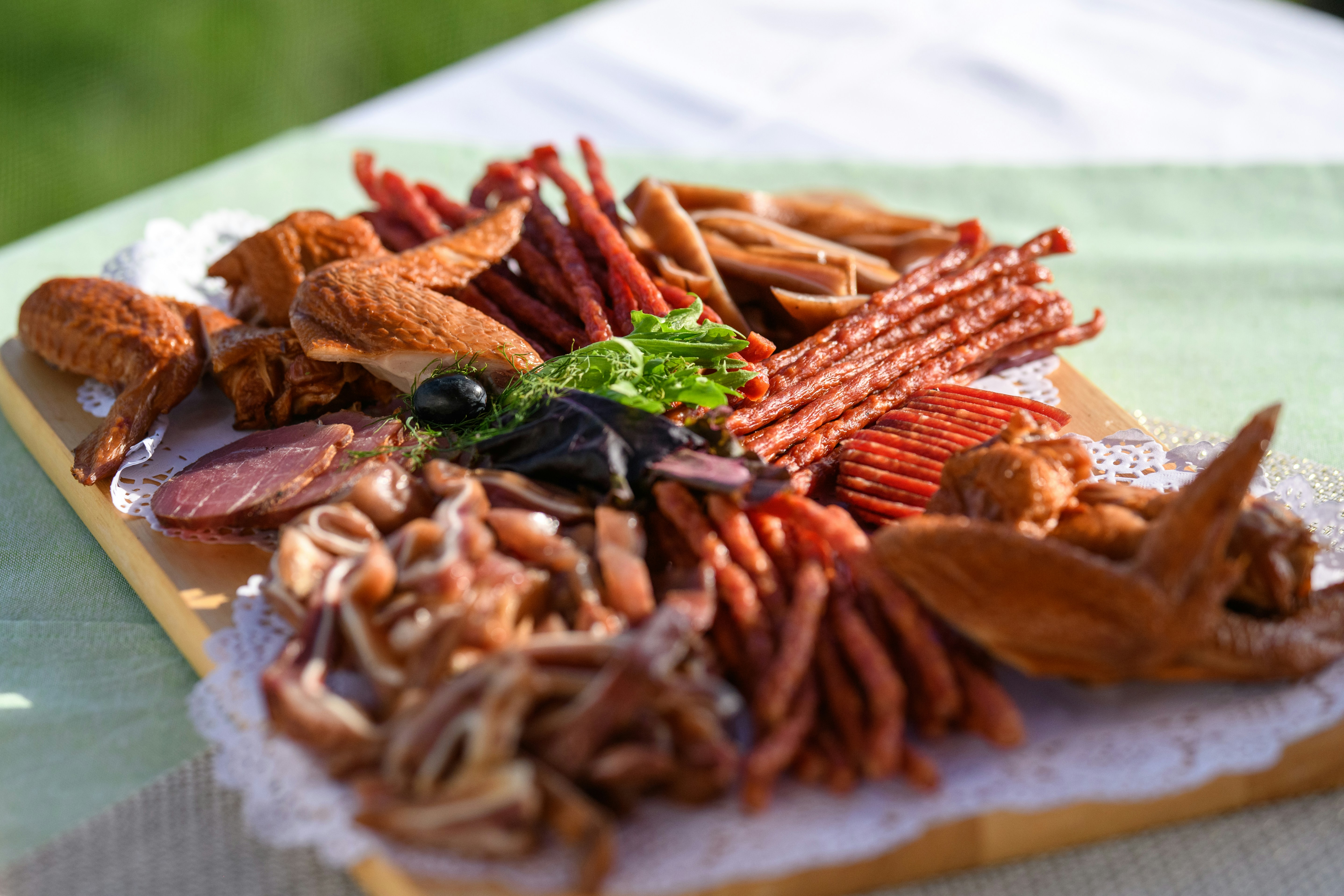 a plate of food on a table outdoors