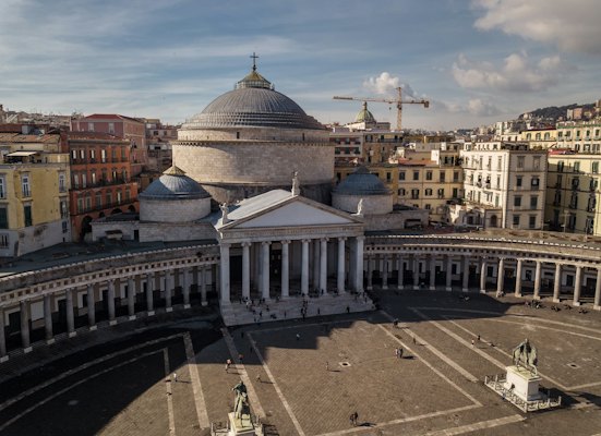 An aerial view of a large building with a dome — Naples, Italy