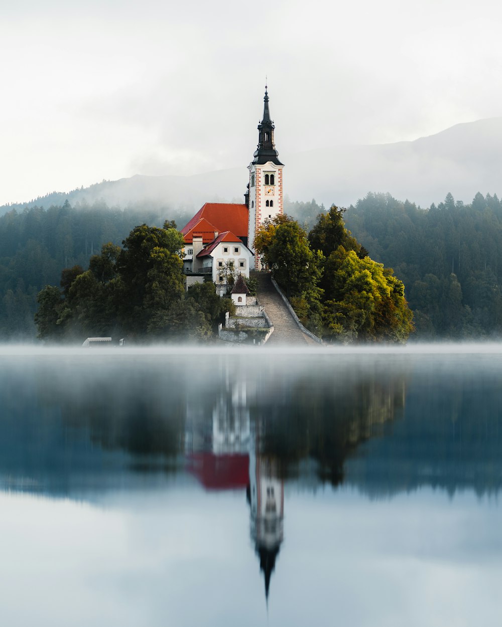 a small island with a church on top of it