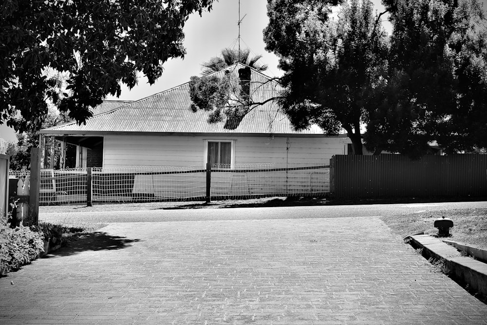 a black and white photo of a house