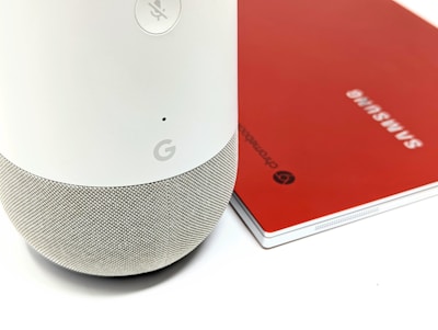 a close up of a smart device near a red card