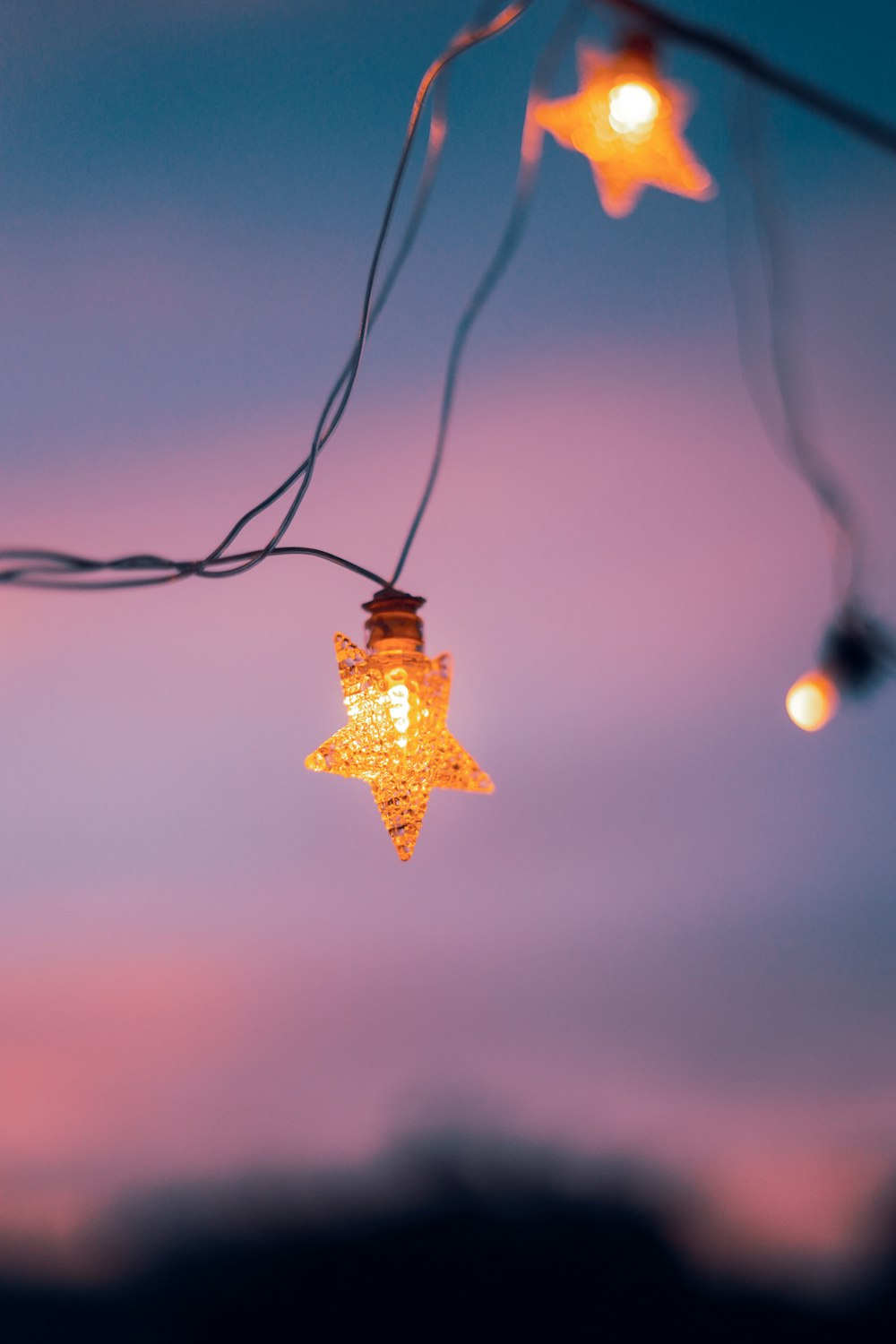 a string of lights hanging from a string