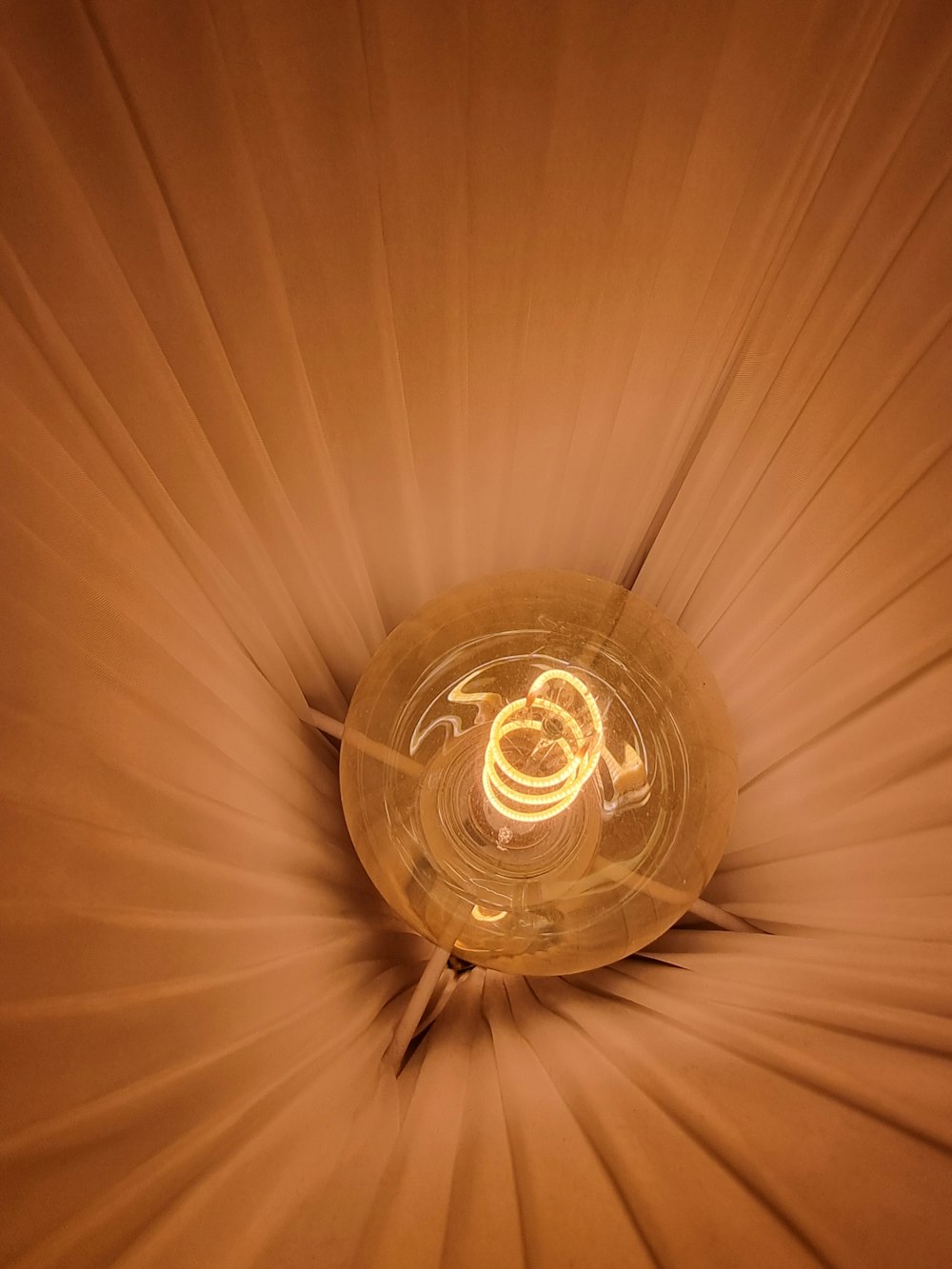 a close up of a light fixture in a room