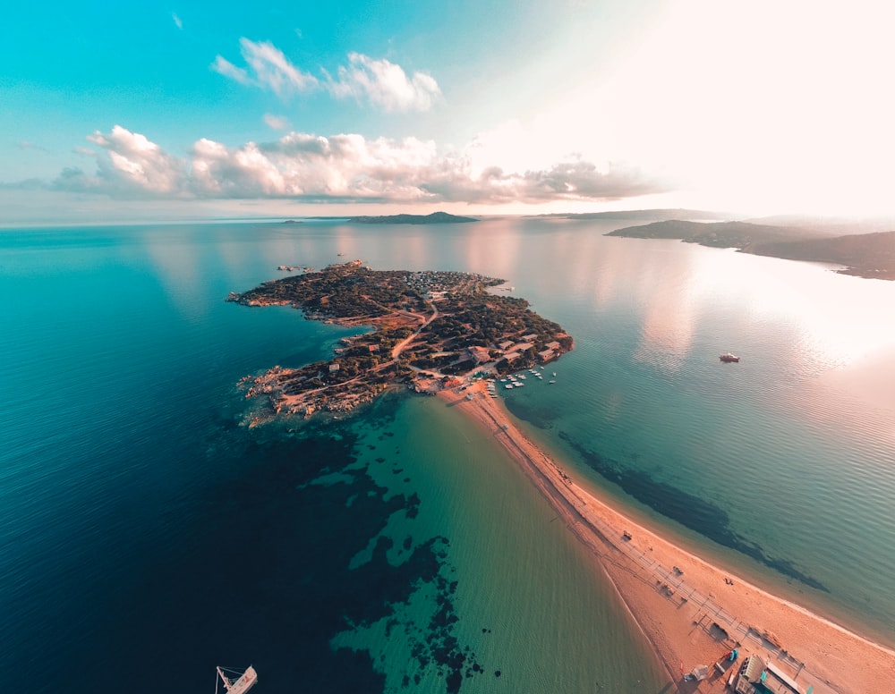 an aerial view of a beach and a body of water