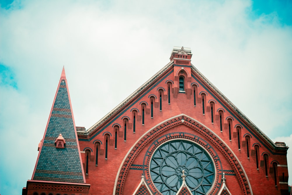 a large church with a clock on the front of it