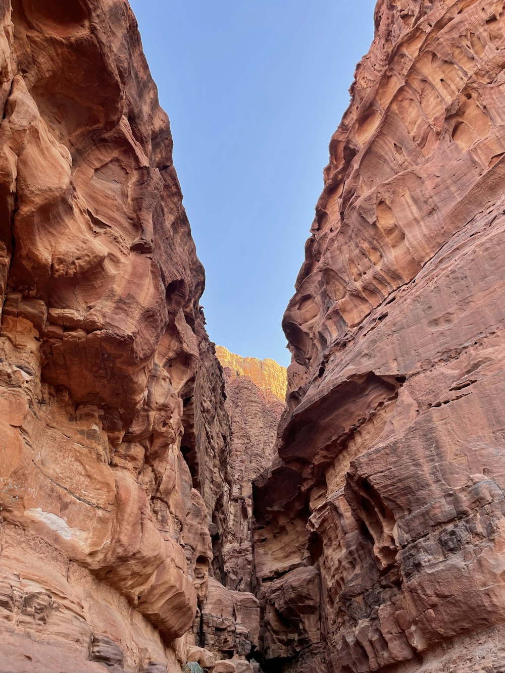 a narrow slot in the side of a mountain