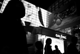 a group of people standing in front of a building