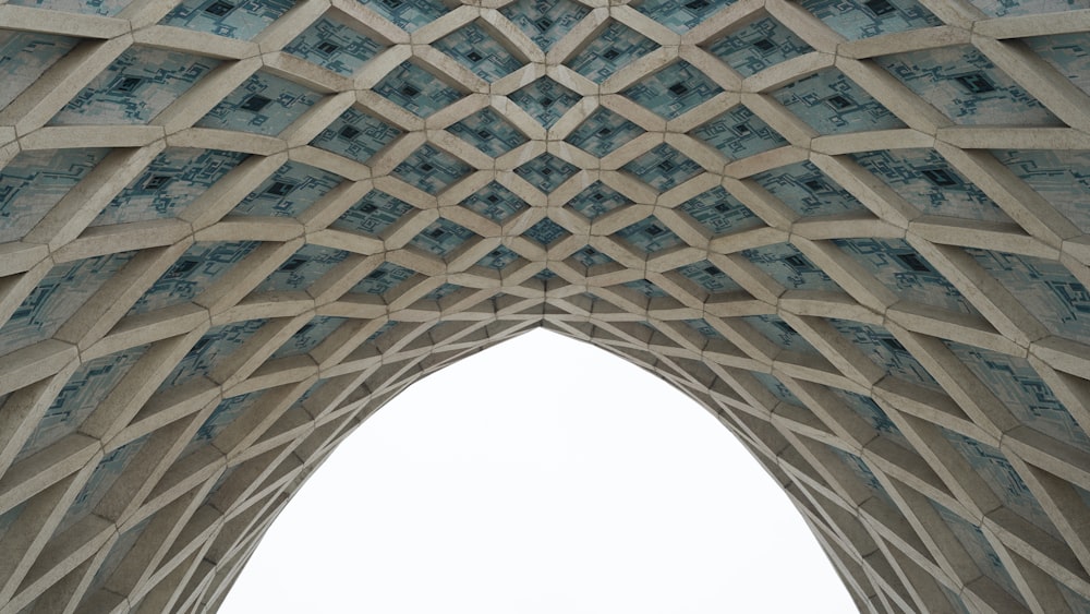 a view of the top of a building from below